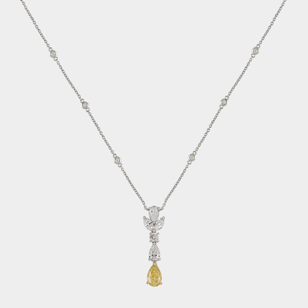 FANCY YELLOW DIAMOND  CHAIN GOLD 18KT